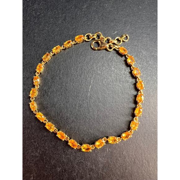 Yellow spessartine garnet tennis bracelet in gold over sterling silver